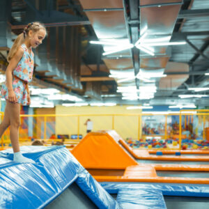 girl at an indoor trampoline park